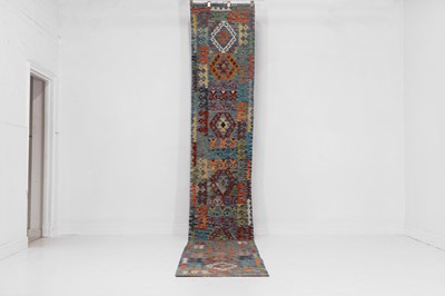 Lot 399 - A flat-weave wool runner of Anatolian design