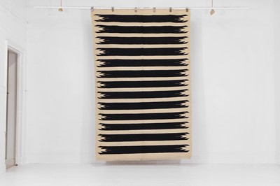 Lot 458 - A Navajo-inspired flat-weave wool rug