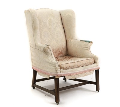 Lot 433 - A George III mahogany wing armchair