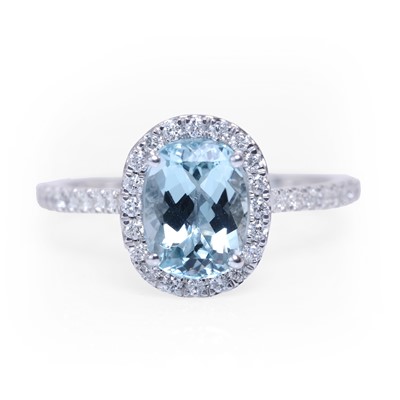 Lot 112 - A platinum aquamarine and diamond cluster ring
