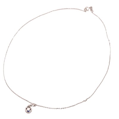 Lot 86 - A sapphire and diamond cluster pendant necklace