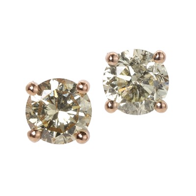 Lot 64 - A pair of coloured diamond stud earrings