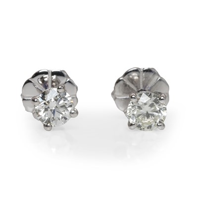 Lot 57 - A pair of white gold diamond studs