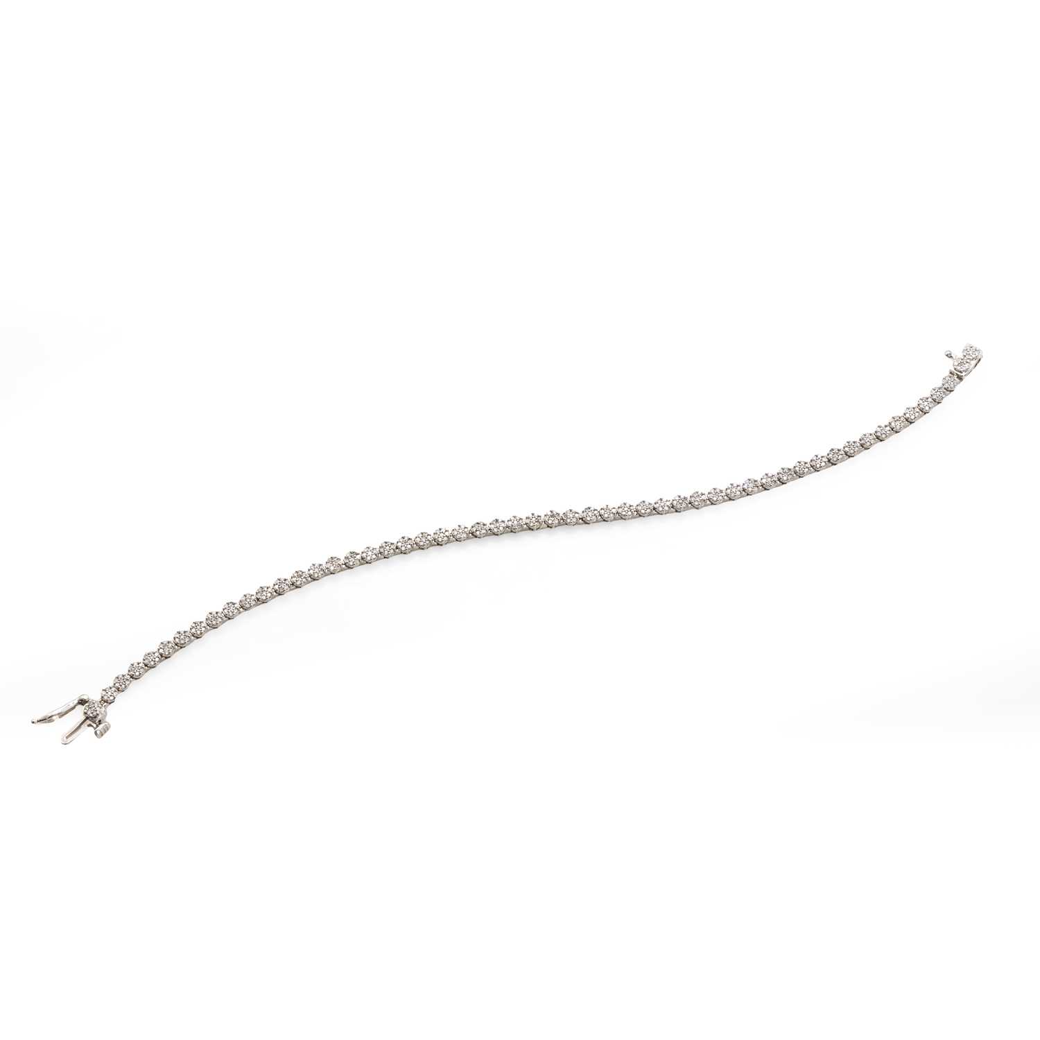 Lot 63 - A white gold diamond line bracelet