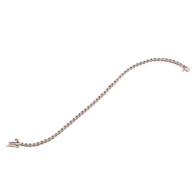 Lot 63 - A white gold diamond line bracelet