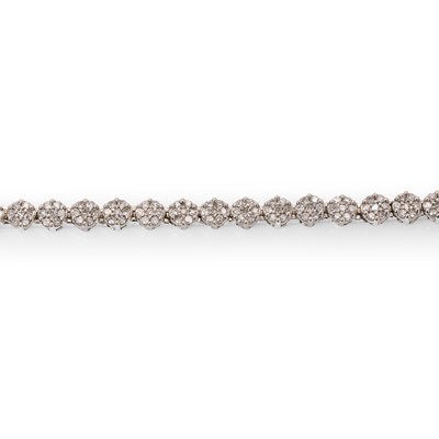 Lot 63 - A white gold diamond line bracelet