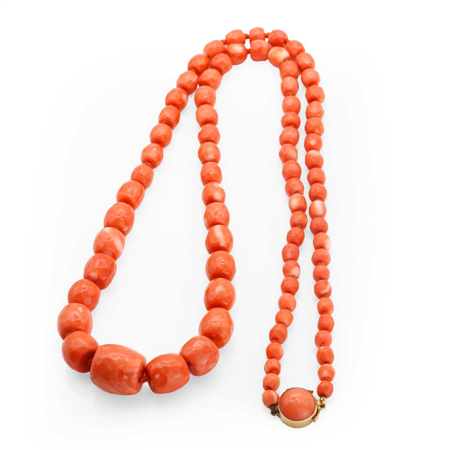 Lot 124 - A single row graduated red coral bead necklace