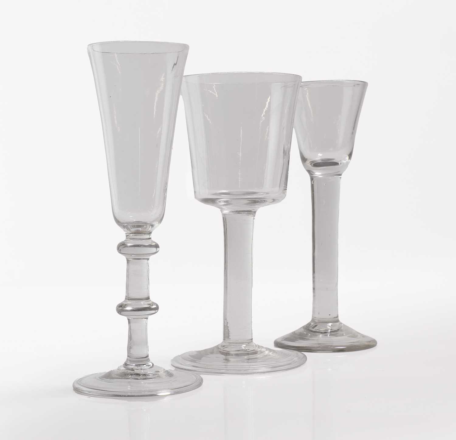 Lot 6 - A group of three plain stem drinking glasses