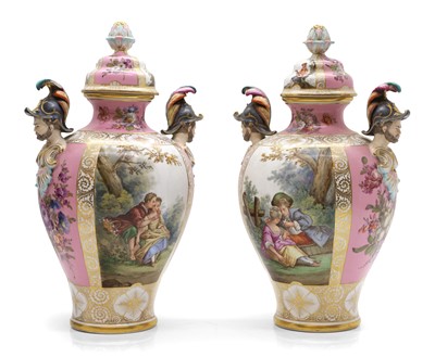 Lot 109 - A pair of Dresden mask vases and covers