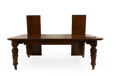 Lot 449 - A late Victorian oak extending dining table, with three extra leaves