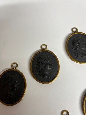 Lot 167 - A set of twelve Wedgwood black basalt medallions