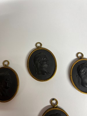 Lot 167 - A set of twelve Wedgwood black basalt medallions
