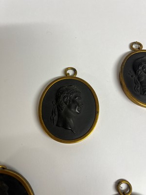 Lot 167 - A set of twelve Wedgwood black basalt medallions