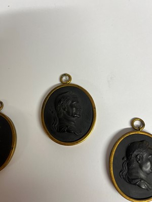 Lot 167 - A set of twelve Wedgwood black basalt medallions