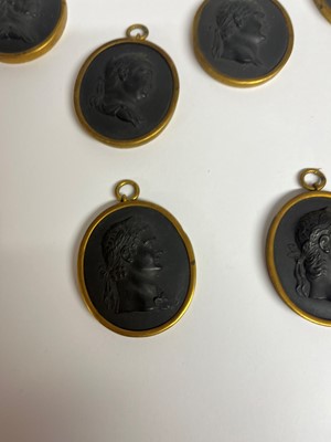 Lot 167 - A set of twelve Wedgwood black basalt medallions