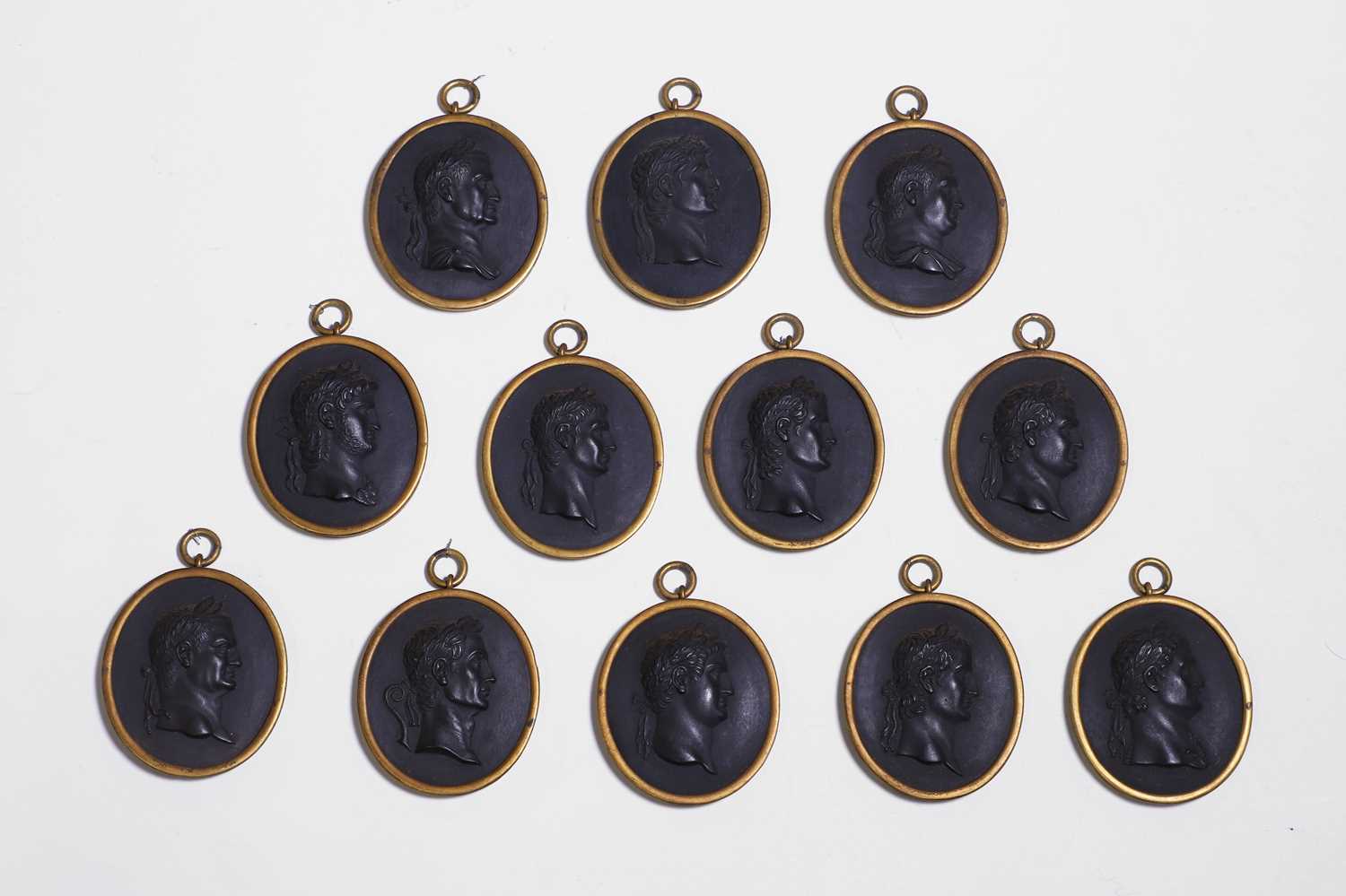 Lot 167 - A set of twelve Wedgwood black basalt medallions