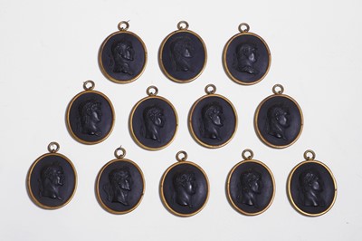 Lot A set of twelve Wedgwood black basalt medallions