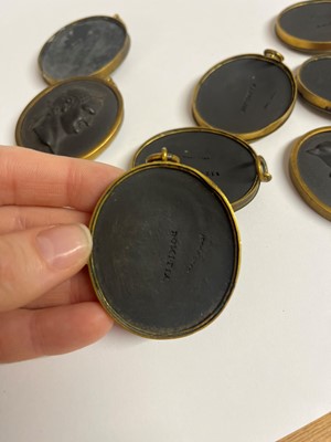 Lot 167 - A set of twelve Wedgwood black basalt medallions