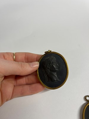 Lot 167 - A set of twelve Wedgwood black basalt medallions