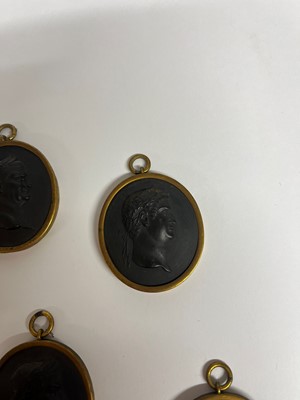 Lot 167 - A set of twelve Wedgwood black basalt medallions