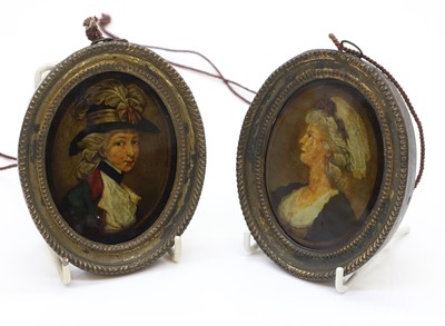 Lot 356 - A pair of reverse-painted glass portraits