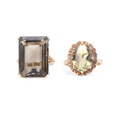 Lot 196 - A 9ct gold Cairngorm citrine ring and a smoky quartz ring