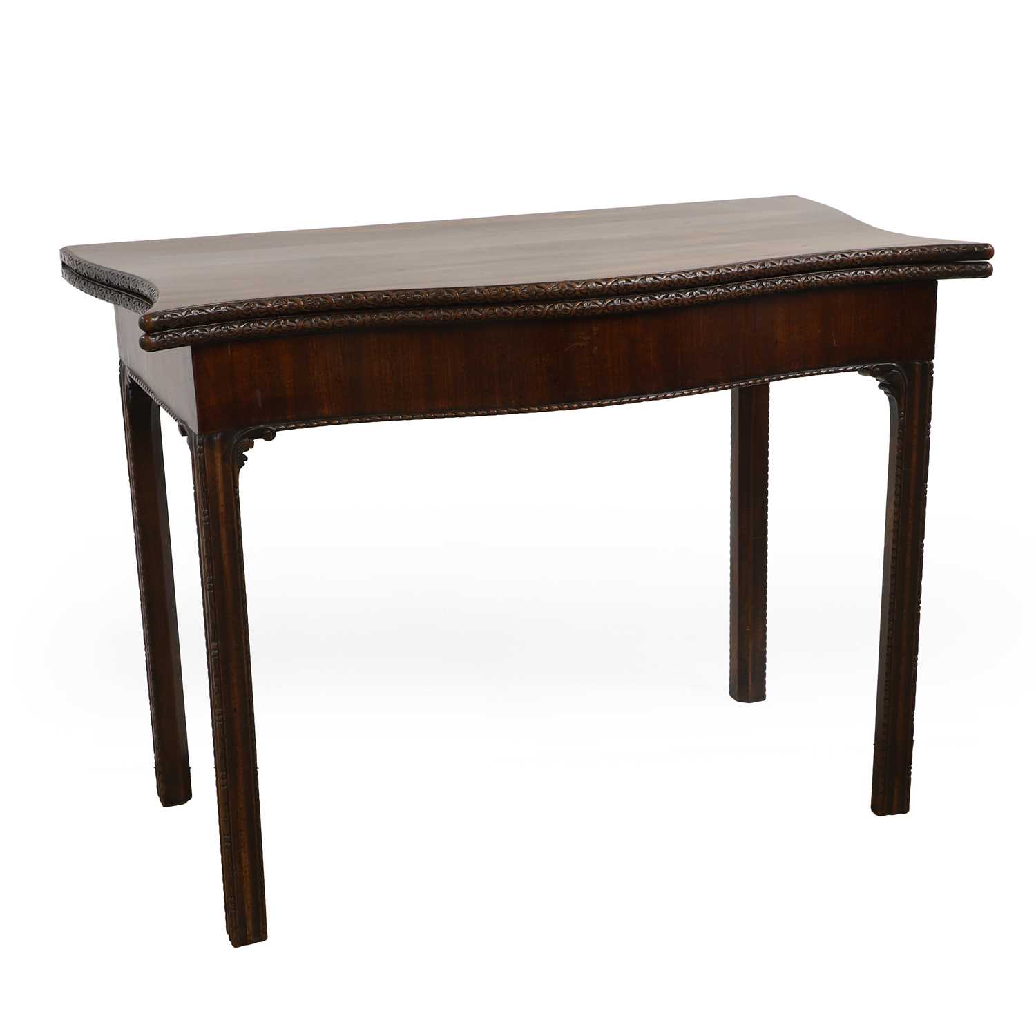 Lot 444 - A George III mahogany serpentine card table