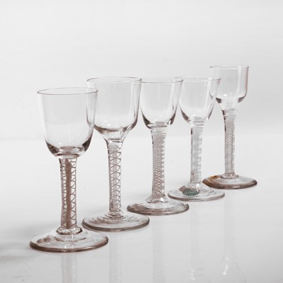 Lot 17 - A group of five opaque-twist wine glasses