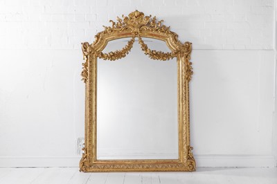 Lot 449 - A carved giltwood and gesso overmantel mirror in the Louis XV style