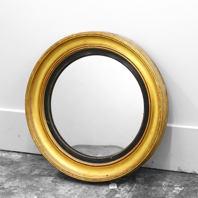 Lot 493 - A Regency giltwood convex wall mirror