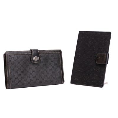 Lot 1438 - Two Gucci wallets