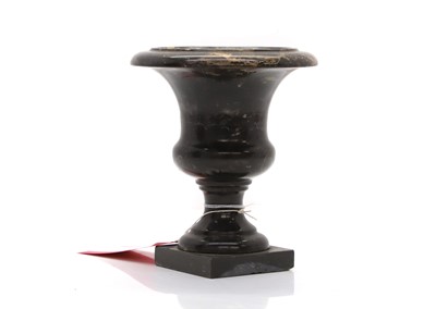 Lot 305 - A black and pink marble urn