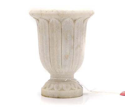 Lot 307 - A marble composition urn