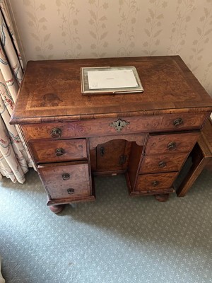 Lot 280 - A small Queen Anne walnut and oak kneehole desk