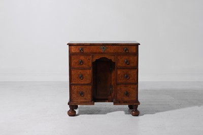 Lot 280 - A small Queen Anne walnut and oak kneehole desk