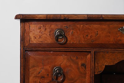 Lot 280 - A small Queen Anne walnut and oak kneehole desk