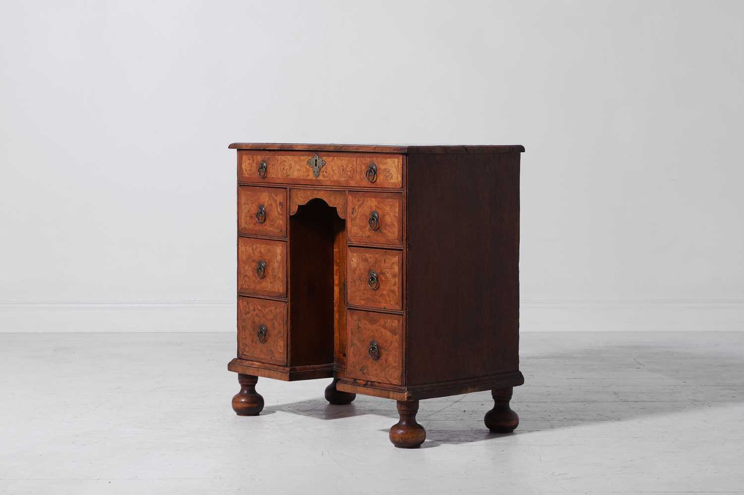 Lot 280 - A small Queen Anne walnut and oak kneehole desk