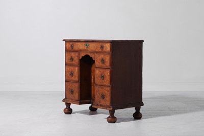 Lot 280 - A small Queen Anne walnut and oak kneehole desk