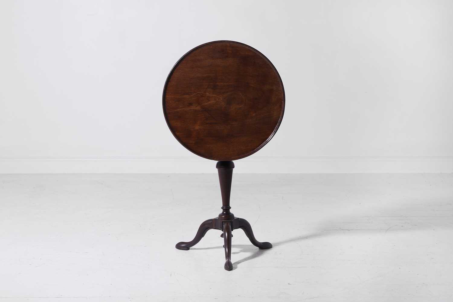 Lot 259 - A George II walnut tripod table