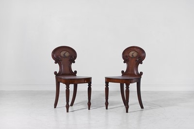 Lot 282 - A pair of Regency mahogany hall chairs