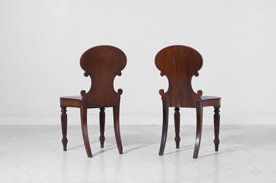Lot 282 - A pair of Regency mahogany hall chairs