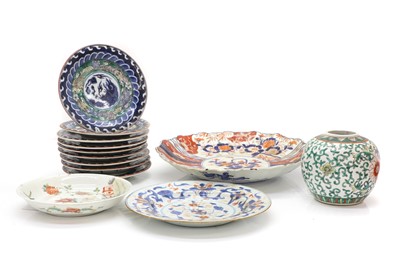 Lot 51 - A collection of nine Japanese polychrome saucers