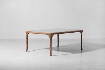 Lot 45 - A giltwood and black lacquer coffee table by Mallet