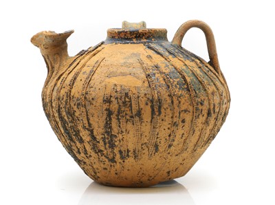 Lot 235 - A terracotta stoneware spouted jug