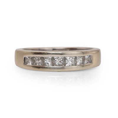 Lot 60 - An 18ct gold diamond half eternity ring