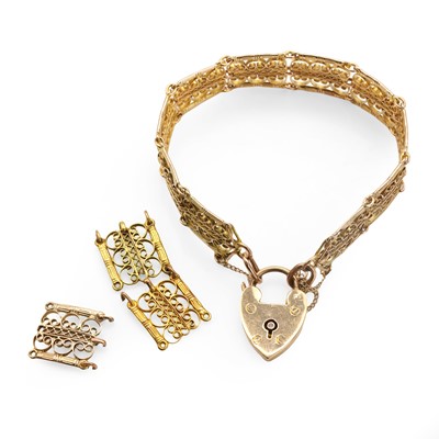Lot 304 - A gold gate bracelet