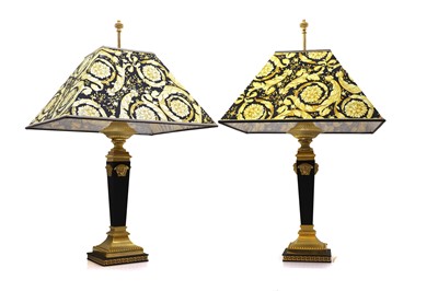 Lot 418 - A pair of Versace Medusa table lamps