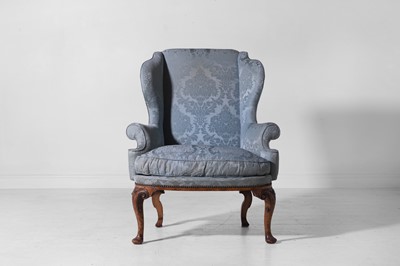 Lot 41 - A Queen Anne-style wingback armchair
