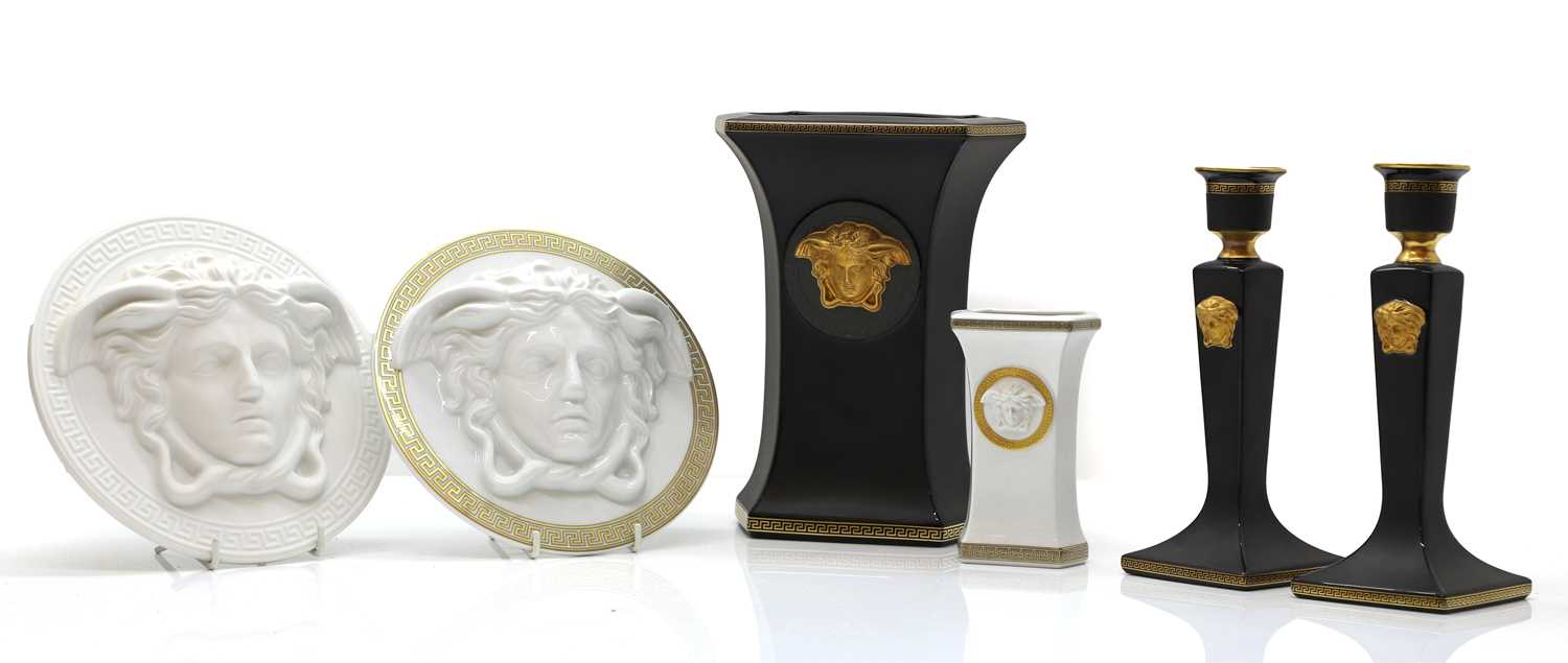 Lot 194 - A pair of Rosenthal for Versace 'Gorgona' candlestick holders