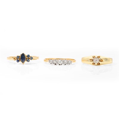 Lot 217 - A group of three diamond and gemstone set rings